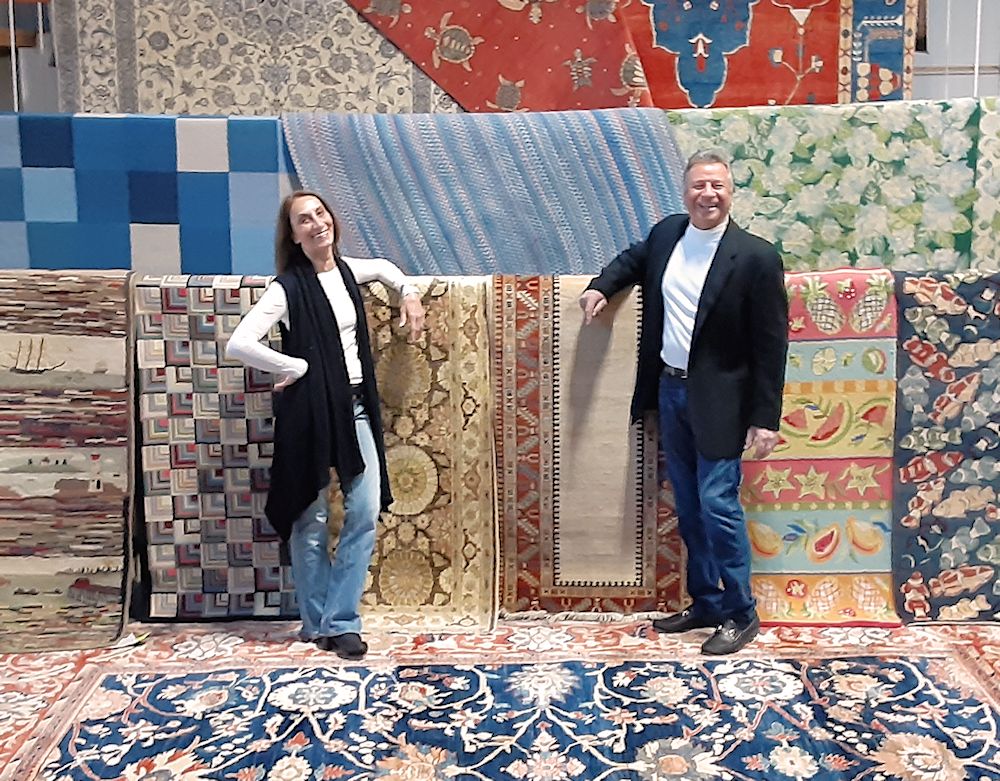 Joe and Marion with cascading oriental rugs